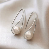 Aretes Elegantes de Perla Místico